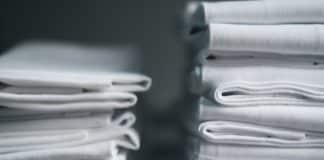 stack of gray plastic packs