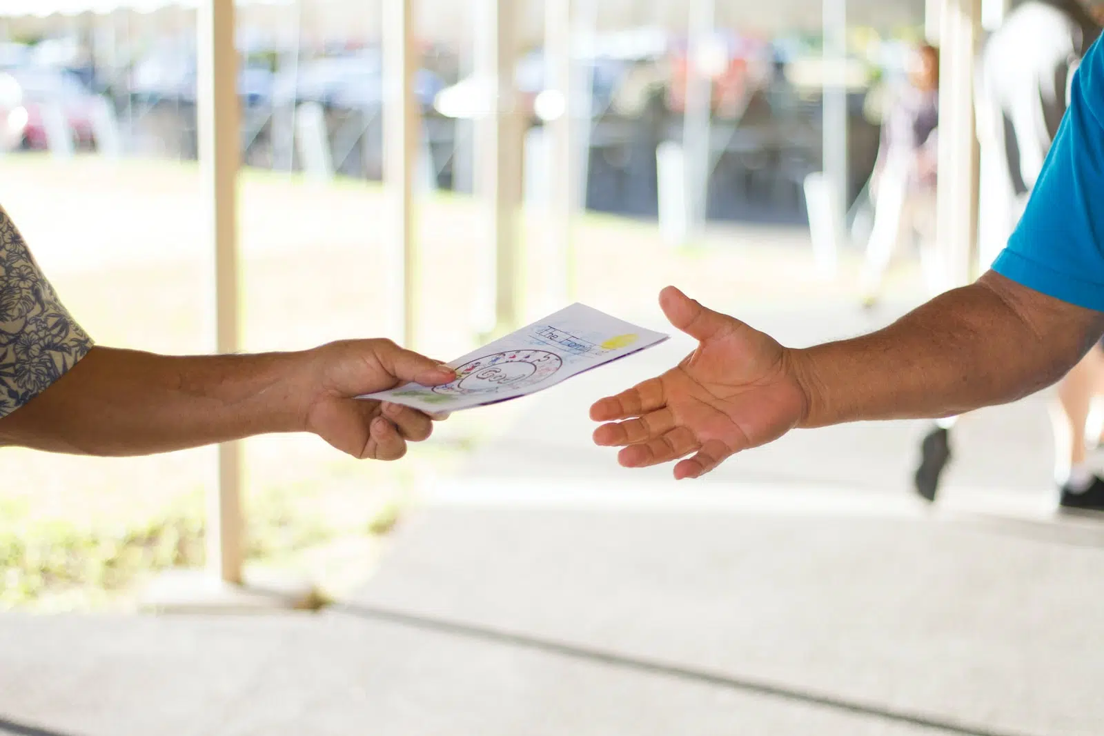 person holding card